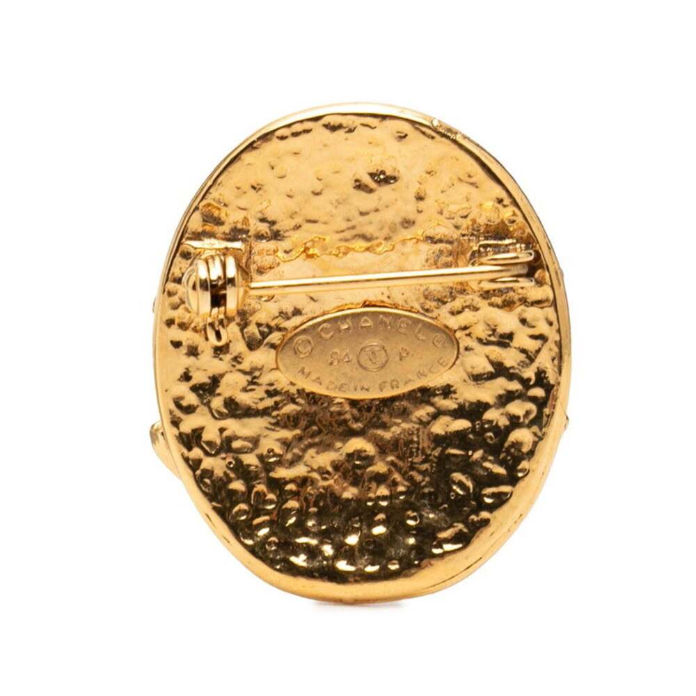 CHANEL Gold Logo Brooch - Picture 2 of 3